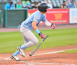 PGX Miami Vice Long Cuff Batting Gloves on-field lifestyle view